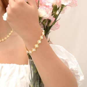 PULSERA CONCHA CON PERLAS