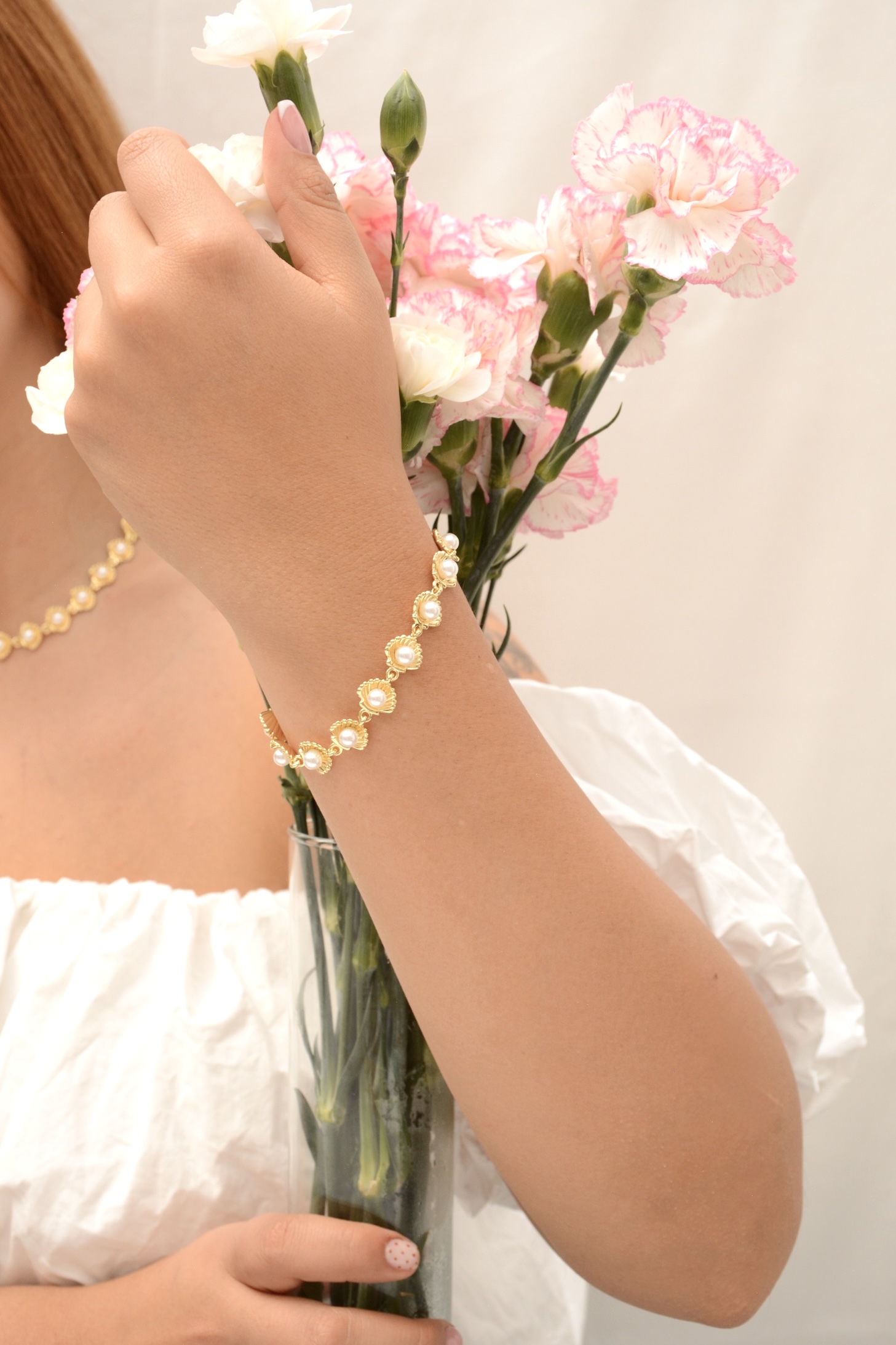 PULSERA CONCHA CON PERLAS